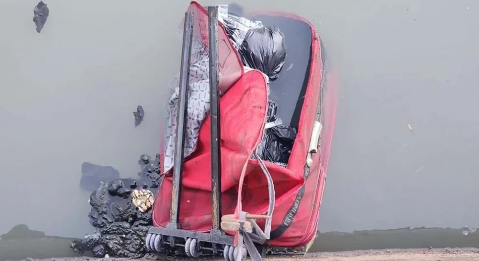 Hallaron a un empresario descuartizado dentro de una valija en un arroyo